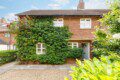 A West Wittering Beach House with ivy-covered walls and bricks.