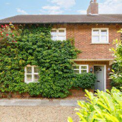 A West Wittering Beach House with ivy-covered walls and bricks.